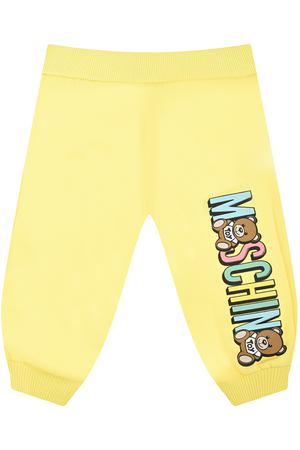 Желтые спортивные брюки с лого Moschino